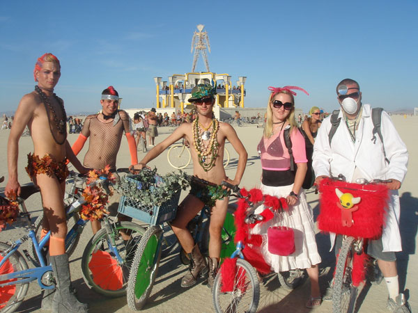 Here is Adam Lambert at Burning Man He's on the far left